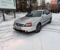 Серый Шевроле Эванда, объемом двигателя 2 л и пробегом 215 тыс. км за 2900 $, фото 1 на Automoto.ua