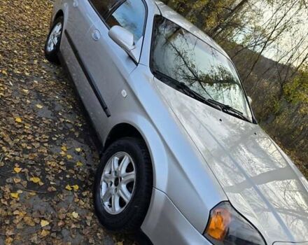 Серый Шевроле Эванда, объемом двигателя 2 л и пробегом 314 тыс. км за 3900 $, фото 1 на Automoto.ua