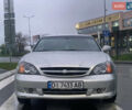 Серый Шевроле Эванда, объемом двигателя 2 л и пробегом 210 тыс. км за 3300 $, фото 1 на Automoto.ua