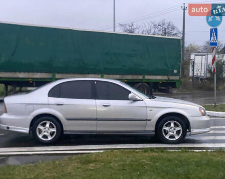 Серый Шевроле Эванда, объемом двигателя 2 л и пробегом 210 тыс. км за 3300 $, фото 4 на Automoto.ua