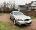 Сірий Шевроле Еванда, об'ємом двигуна 2.5 л та пробігом 310 тис. км за 3000 $, фото 1 на Automoto.ua
