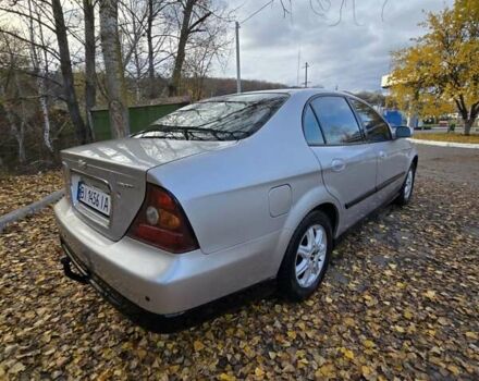 Серый Шевроле Эванда, объемом двигателя 2 л и пробегом 314 тыс. км за 3900 $, фото 8 на Automoto.ua