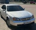 Серый Шевроле Эванда, объемом двигателя 2 л и пробегом 100 тыс. км за 2204 $, фото 1 на Automoto.ua