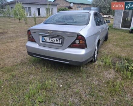 Сірий Шевроле Еванда, об'ємом двигуна 2.5 л та пробігом 240 тис. км за 3100 $, фото 3 на Automoto.ua
