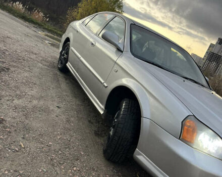 Серый Шевроле Эванда, объемом двигателя 2 л и пробегом 260 тыс. км за 3799 $, фото 1 на Automoto.ua