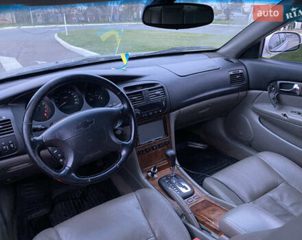 Серый Шевроле Эванда, объемом двигателя 2 л и пробегом 210 тыс. км за 3300 $, фото 10 на Automoto.ua