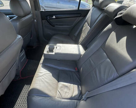 Серый Шевроле Эванда, объемом двигателя 2 л и пробегом 350 тыс. км за 3111 $, фото 8 на Automoto.ua