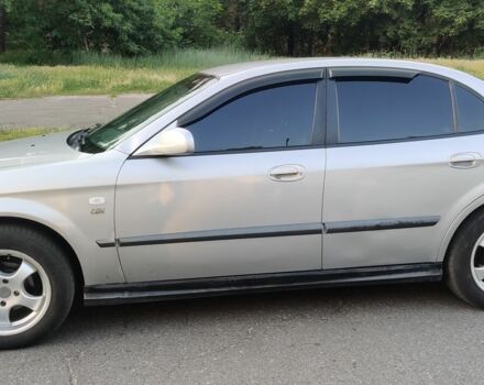 Сірий Шевроле Еванда, об'ємом двигуна 2 л та пробігом 219 тис. км за 3999 $, фото 1 на Automoto.ua