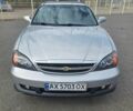 Сірий Шевроле Еванда, об'ємом двигуна 2.5 л та пробігом 100 тис. км за 4700 $, фото 1 на Automoto.ua
