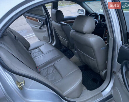 Серый Шевроле Эванда, объемом двигателя 2 л и пробегом 210 тыс. км за 3300 $, фото 7 на Automoto.ua