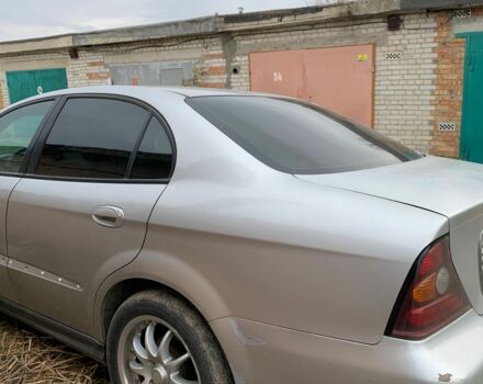 Серый Шевроле Эванда, объемом двигателя 2.5 л и пробегом 310 тыс. км за 2100 $, фото 2 на Automoto.ua