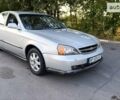 Сірий Шевроле Еванда, об'ємом двигуна 2 л та пробігом 175 тис. км за 3200 $, фото 1 на Automoto.ua