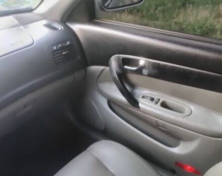 Сірий Шевроле Еванда, об'ємом двигуна 2 л та пробігом 219 тис. км за 3999 $, фото 19 на Automoto.ua