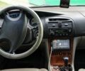 Сірий Шевроле Еванда, об'ємом двигуна 2.49 л та пробігом 210 тис. км за 3500 $, фото 1 на Automoto.ua
