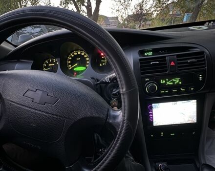 Серый Шевроле Эванда, объемом двигателя 2 л и пробегом 209 тыс. км за 3200 $, фото 7 на Automoto.ua