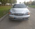 Серый Шевроле Эванда, объемом двигателя 2.5 л и пробегом 170 тыс. км за 5700 $, фото 1 на Automoto.ua