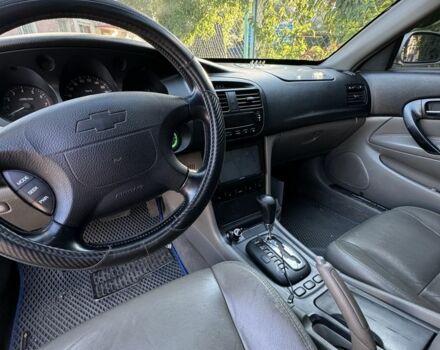 Серый Шевроле Эванда, объемом двигателя 2 л и пробегом 209 тыс. км за 3200 $, фото 5 на Automoto.ua