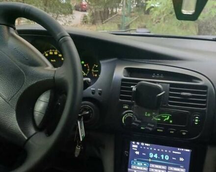 Серый Шевроле Эванда, объемом двигателя 2 л и пробегом 197 тыс. км за 3900 $, фото 6 на Automoto.ua