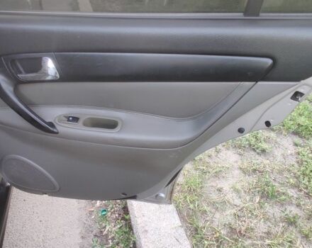 Сірий Шевроле Еванда, об'ємом двигуна 2 л та пробігом 219 тис. км за 3999 $, фото 13 на Automoto.ua