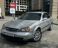 Серый Шевроле Эванда, объемом двигателя 2 л и пробегом 240 тыс. км за 2700 $, фото 1 на Automoto.ua