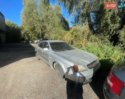 Серый Шевроле Эванда, объемом двигателя 2 л и пробегом 300 тыс. км за 1300 $, фото 1 на Automoto.ua