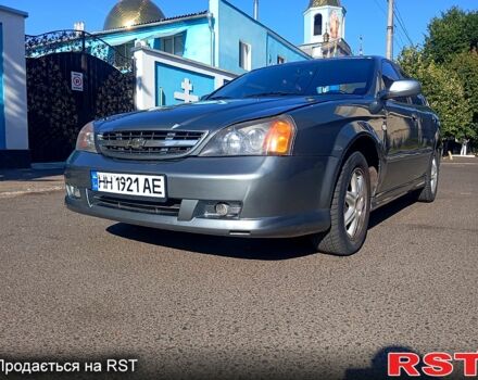 Сірий Шевроле Еванда, об'ємом двигуна 2 л та пробігом 288 тис. км за 3400 $, фото 1 на Automoto.ua