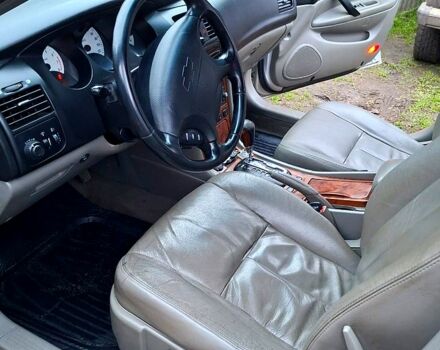 Серый Шевроле Эванда, объемом двигателя 2 л и пробегом 180 тыс. км за 3200 $, фото 1 на Automoto.ua