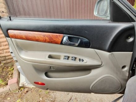 Серый Шевроле Эванда, объемом двигателя 2 л и пробегом 325 тыс. км за 2000 $, фото 1 на Automoto.ua