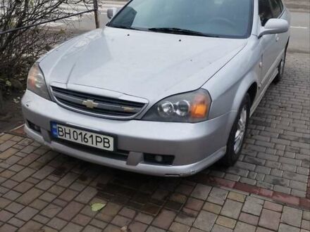 Серый Шевроле Эванда, объемом двигателя 2 л и пробегом 400 тыс. км за 3600 $, фото 1 на Automoto.ua