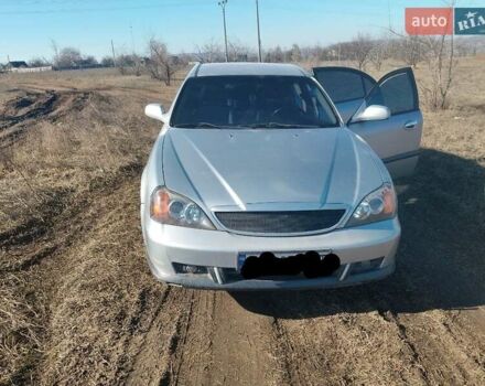 Серый Шевроле Эванда, объемом двигателя 2 л и пробегом 283 тыс. км за 5678 $, фото 1 на Automoto.ua