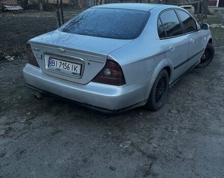 Серый Шевроле Эванда, объемом двигателя 2 л и пробегом 358 тыс. км за 3500 $, фото 1 на Automoto.ua