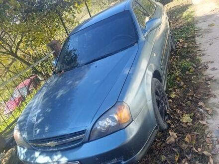 Сірий Шевроле Еванда, об'ємом двигуна 2 л та пробігом 250 тис. км за 2800 $, фото 1 на Automoto.ua