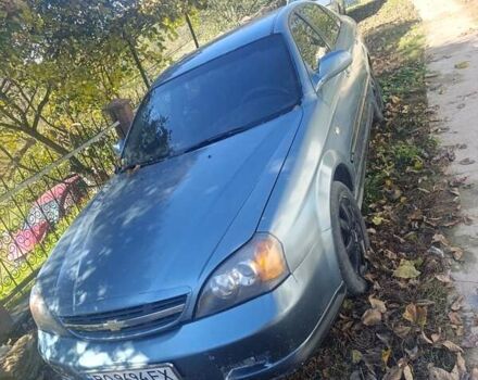 Серый Шевроле Эванда, объемом двигателя 2 л и пробегом 250 тыс. км за 2800 $, фото 1 на Automoto.ua