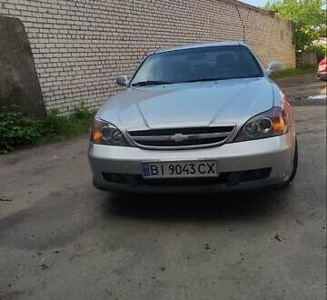 Сірий Шевроле Еванда, об'ємом двигуна 2 л та пробігом 255 тис. км за 4000 $, фото 1 на Automoto.ua