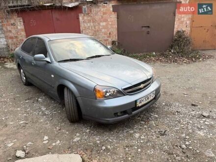 Сірий Шевроле Еванда, об'ємом двигуна 2 л та пробігом 173 тис. км за 3800 $, фото 1 на Automoto.ua