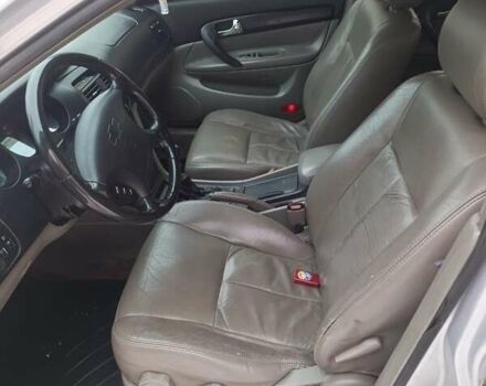 Сірий Шевроле Еванда, об'ємом двигуна 2 л та пробігом 256 тис. км за 3700 $, фото 1 на Automoto.ua