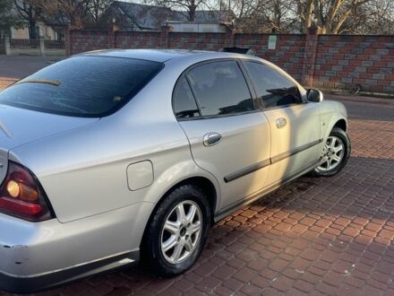 Сірий Шевроле Еванда, об'ємом двигуна 2 л та пробігом 306 тис. км за 4000 $, фото 1 на Automoto.ua