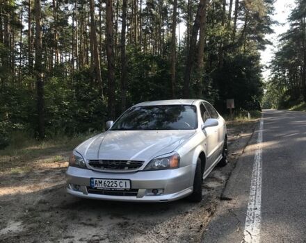 Серый Шевроле Эванда, объемом двигателя 2 л и пробегом 300 тыс. км за 2650 $, фото 1 на Automoto.ua