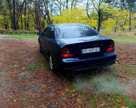 Синий Шевроле Эванда, объемом двигателя 2 л и пробегом 192 тыс. км за 4200 $, фото 2 на Automoto.ua