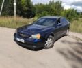 Синій Шевроле Еванда, об'ємом двигуна 2 л та пробігом 400 тис. км за 2449 $, фото 1 на Automoto.ua
