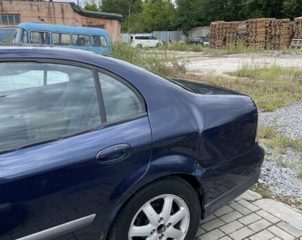 Синій Шевроле Еванда, об'ємом двигуна 2 л та пробігом 240 тис. км за 2000 $, фото 5 на Automoto.ua