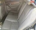 Синий Шевроле Эванда, объемом двигателя 2 л и пробегом 175 тыс. км за 5500 $, фото 6 на Automoto.ua