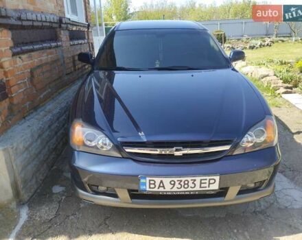 Синий Шевроле Эванда, объемом двигателя 2 л и пробегом 175 тыс. км за 5500 $, фото 1 на Automoto.ua
