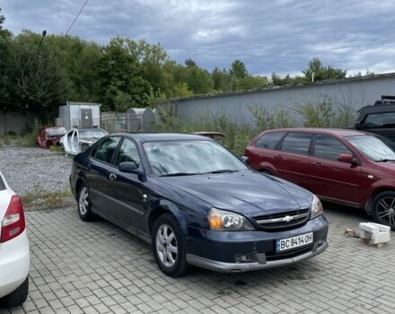 Синій Шевроле Еванда, об'ємом двигуна 2 л та пробігом 240 тис. км за 2000 $, фото 6 на Automoto.ua
