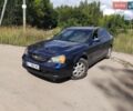 Синій Шевроле Еванда, об'ємом двигуна 2 л та пробігом 400 тис. км за 2450 $, фото 1 на Automoto.ua