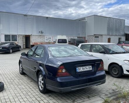 Синій Шевроле Еванда, об'ємом двигуна 2 л та пробігом 240 тис. км за 2000 $, фото 4 на Automoto.ua