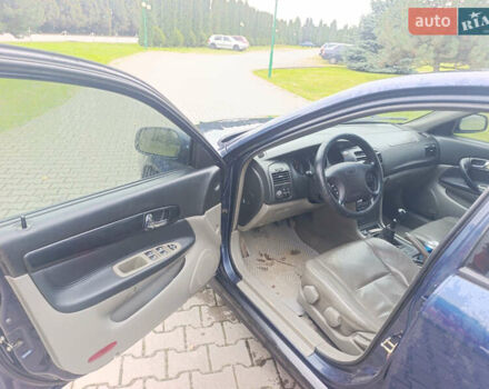 Синій Шевроле Еванда, об'ємом двигуна 2 л та пробігом 400 тис. км за 3300 $, фото 5 на Automoto.ua
