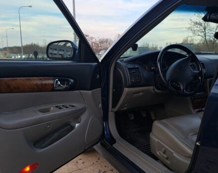 Синий Шевроле Эванда, объемом двигателя 2 л и пробегом 297 тыс. км за 4799 $, фото 4 на Automoto.ua