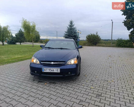 Синій Шевроле Еванда, об'ємом двигуна 2 л та пробігом 400 тис. км за 3300 $, фото 1 на Automoto.ua