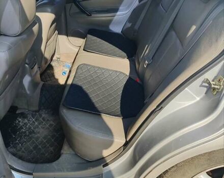 Синий Шевроле Эванда, объемом двигателя 2 л и пробегом 260 тыс. км за 3500 $, фото 3 на Automoto.ua